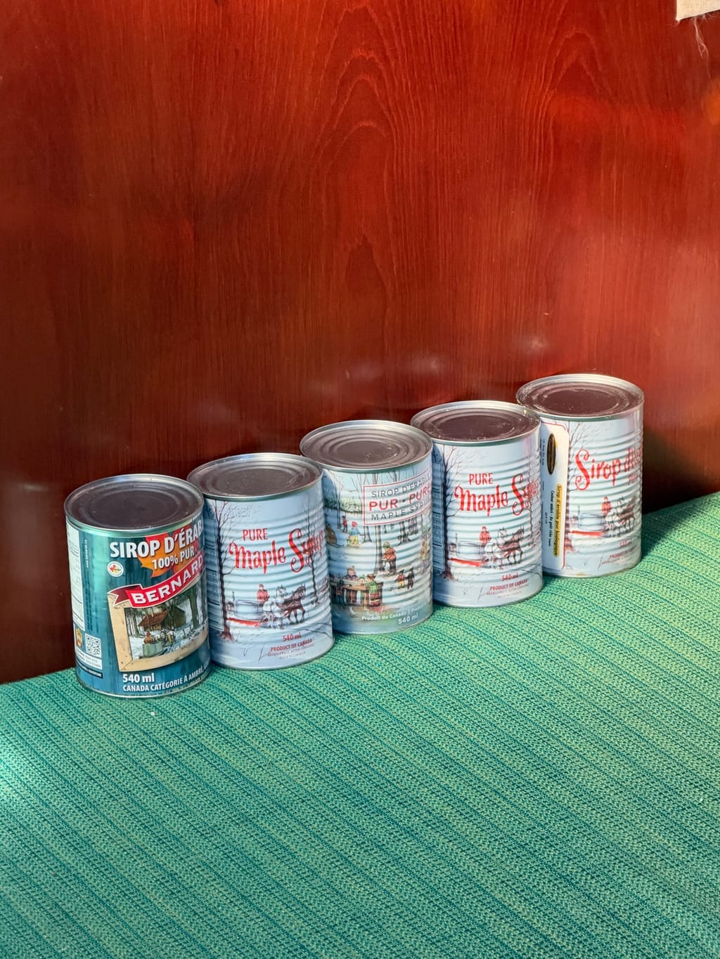 We found FIVE cans of Canadian maple syrup! We also have 10 large jars of chili crisp- we have used 2 already!!!